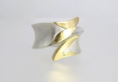 sterling silver ring with 18 karat gold
