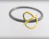 18 karat solid gold oxidized silver Kinetic ring