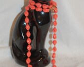 1970s Sarah Coventry Holiday Twisted Bead Necklace in Neon Peach 36 Inches