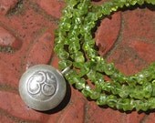 Om Peridot Necklace . Apple Green . Hill Tribe Fine Silver