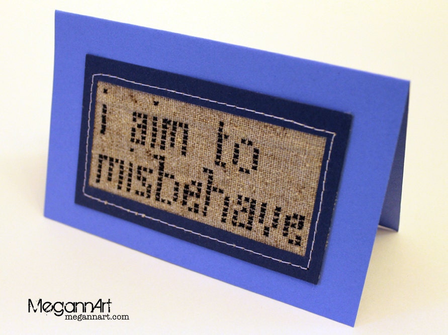 Cross Stitched "I Aim to Misbehave" on Blue Card