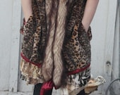 showdiva designs Leopard Faux Fur Knee Length Coat Vest with Silk Asymmetrical Ruffles