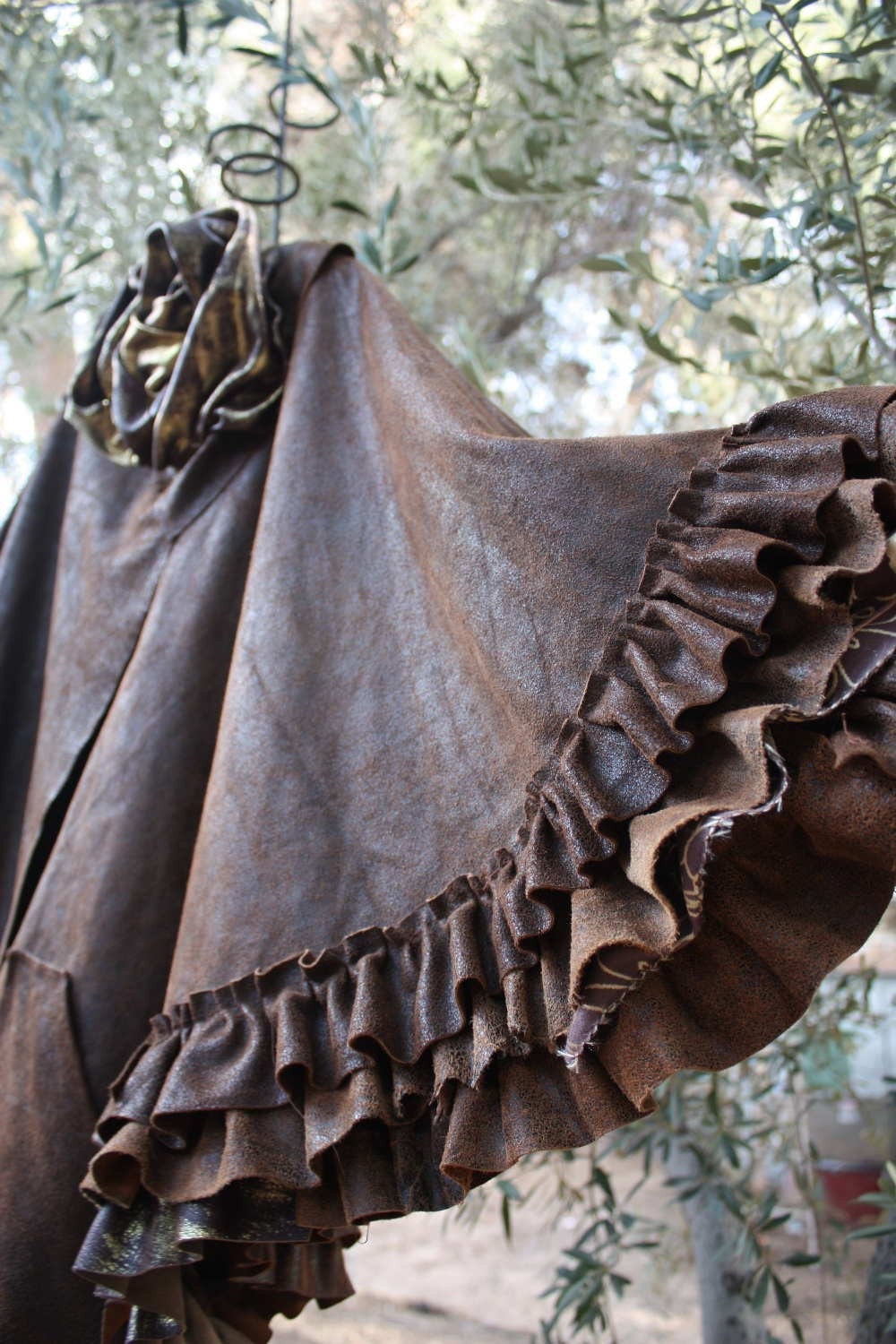 showdiva designs Distressed Brown Leather Cape Coat with Layers of Ruffles n Sculpted Flower n Hints of Gold