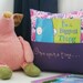 Hand-embroidered Reading Pillow with Book Pocket in Windy Day