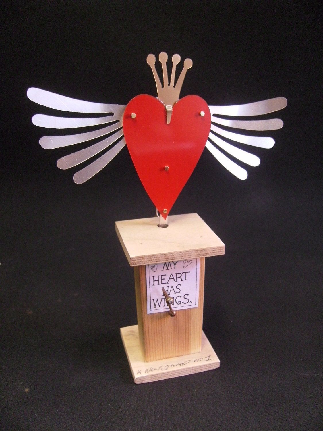 A hand made automata for Valentines day entitled 'My Heart Has Wings'