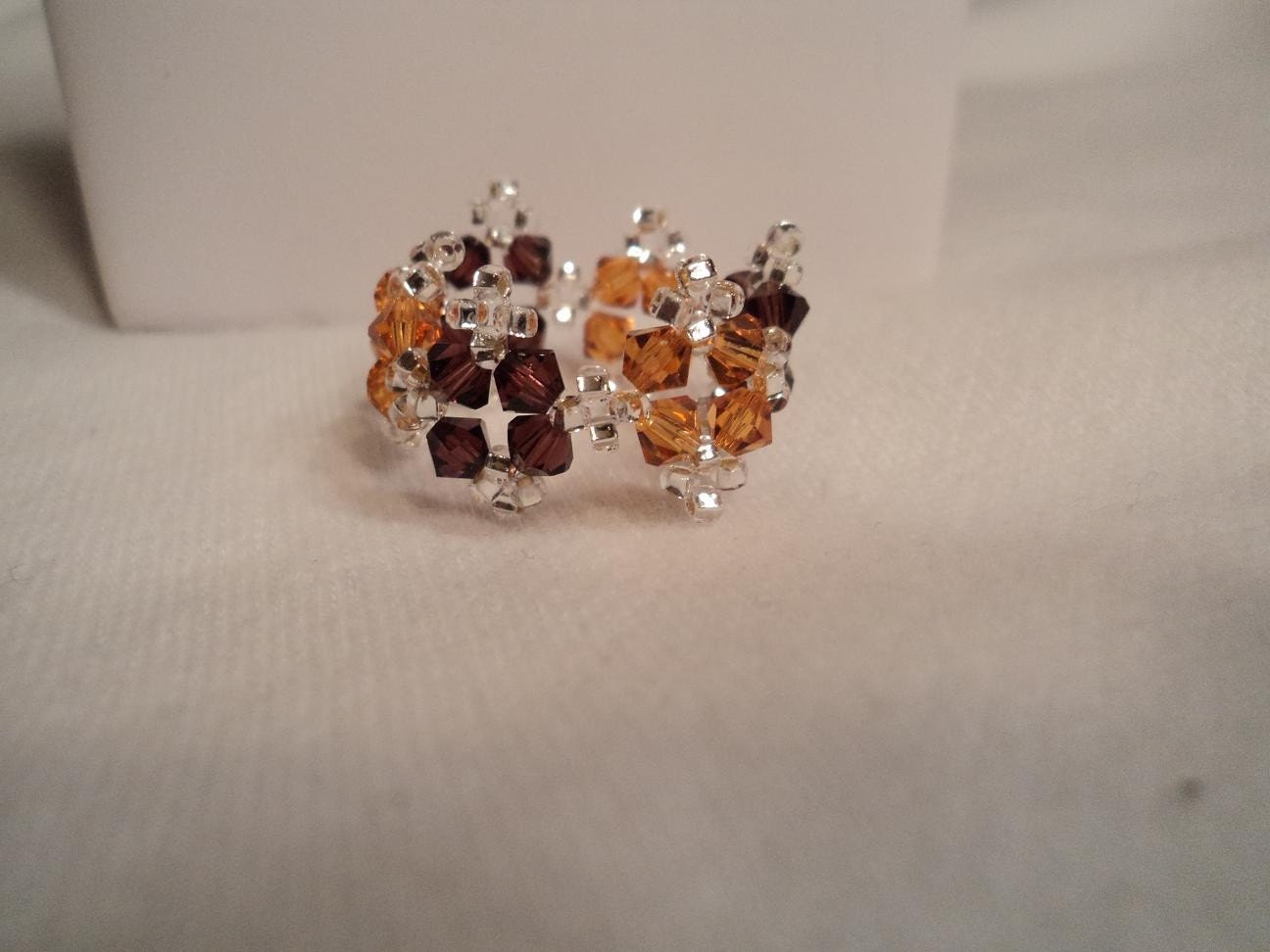 Stunning burgundy and topaz swarovski ring