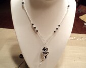 Black and white swarovski crystal twist pendant