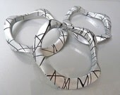 Vintage three grey and black plastic swirl bracelets