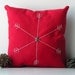 Small red cotton decorative pillow with gray embroidered snowflake and dark grey beads