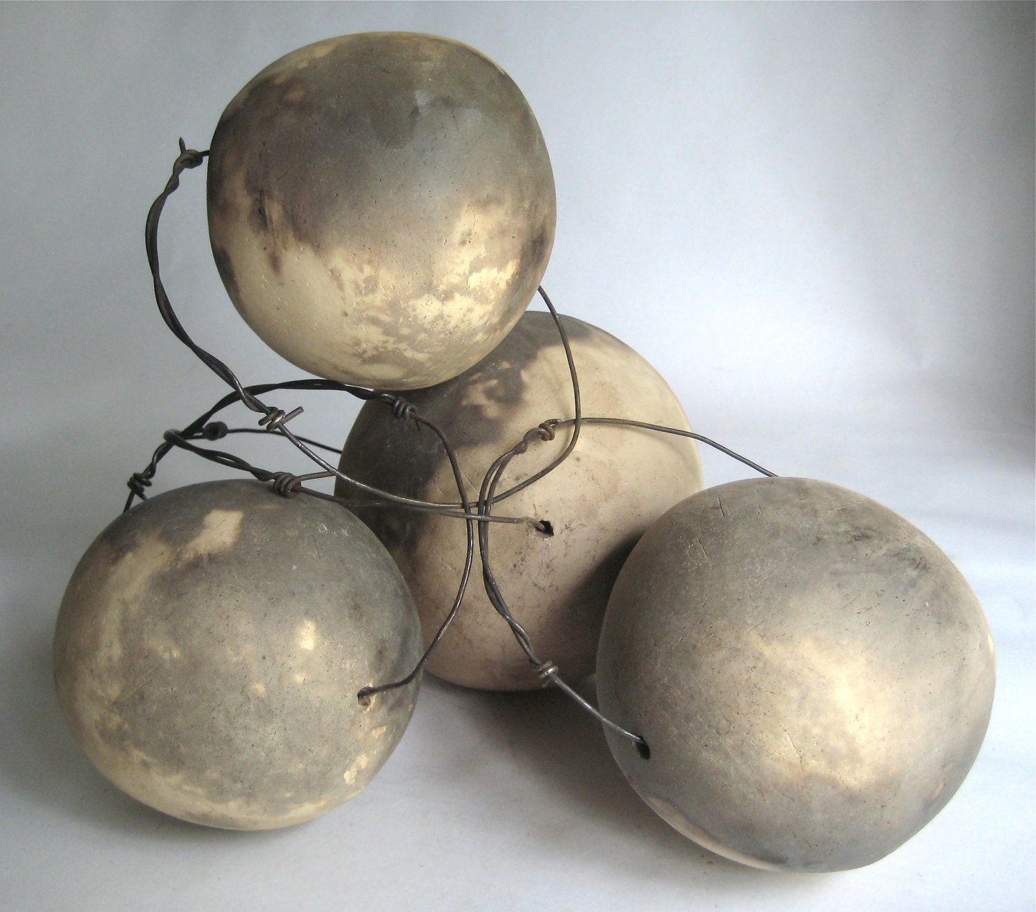 the ties that bind: earthenware and wire sculpture