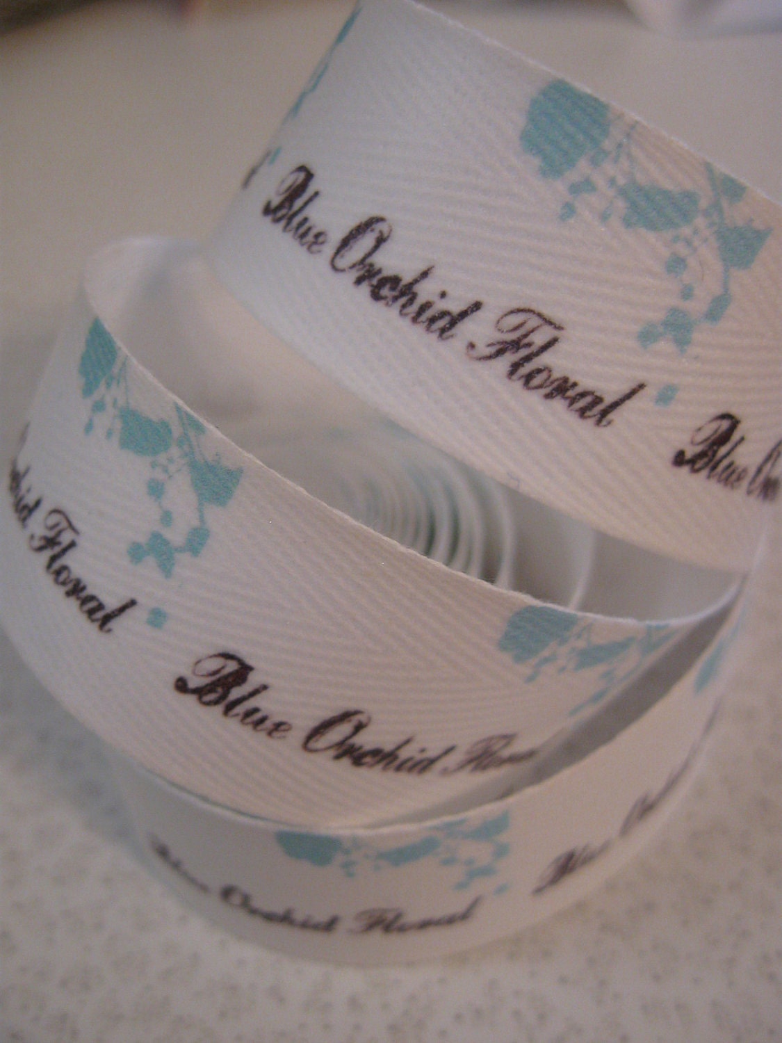 Twill Fabric Labels, one and one-quarter inch ribbon - uncut, spool - natural or white