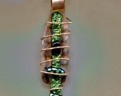 THE EMERALD COCOON...Dichroc Glass Snuggled  and  Wired In Copper  Pendant