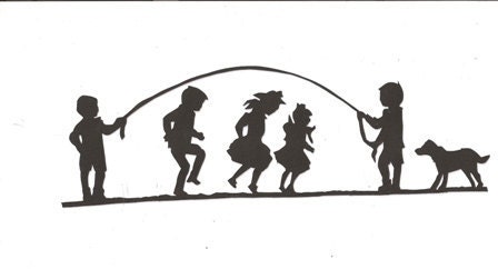 Children playing a game of jump rope silhouette