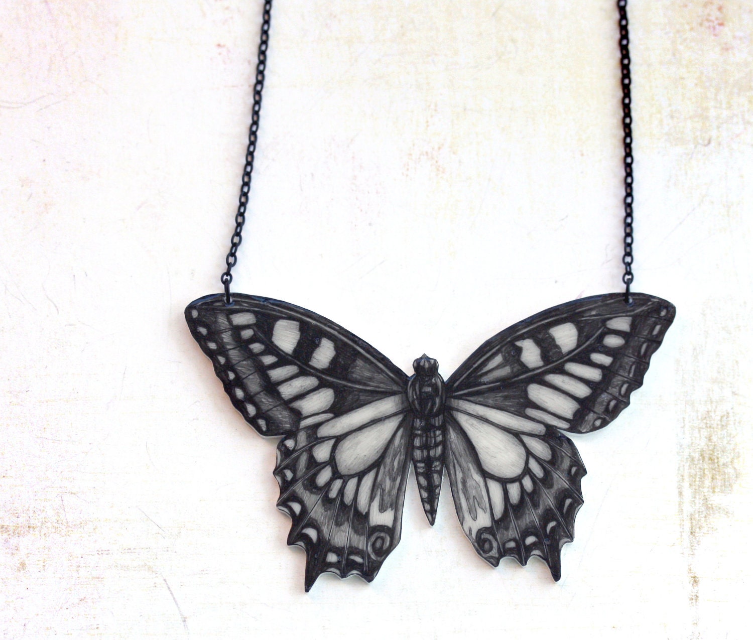 Butterfly necklace -pendant, drawing on plastic