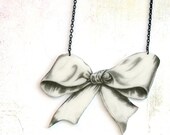 Bow necklace -pendant, drawing on plastic