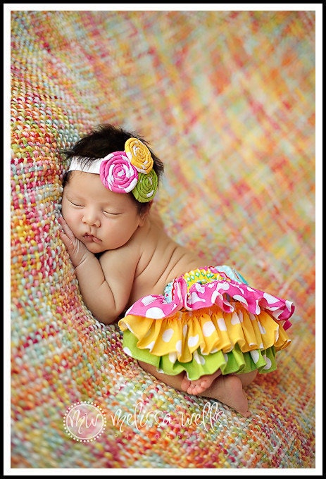 Hot pink, yellow, and lime polka dot ruffle bloomers diaper cover w/matching fabric rosettes on shimmery elastic headband