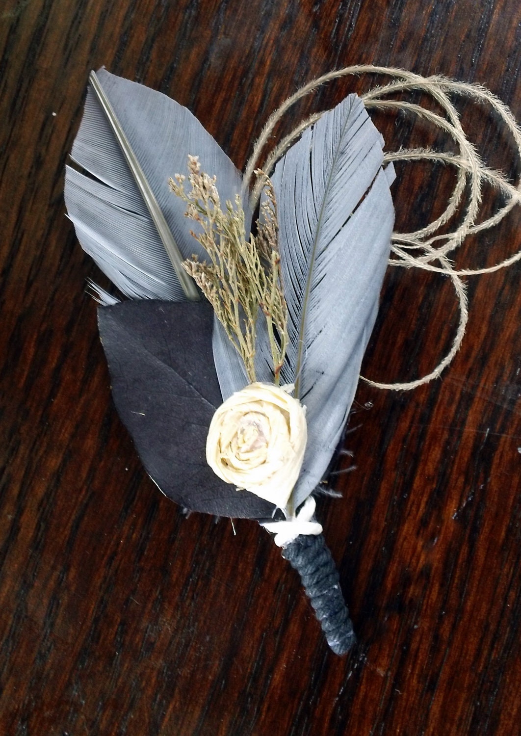 7 All Natural Blue Feather Boutonnieres