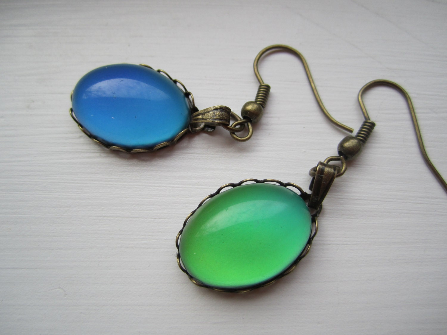 Small Mood dangle earrings in antique brass