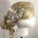 Flower and leaf pave and vines in Crystal settings, clear crystal bicones, Swarovski crystal faceted stones, hand wired into headpiece