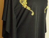 Black slinky Lycra knit bat winged shirt with angel/ devil metallic gold screen printing