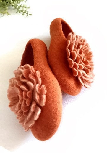 Felted orange wool slippers with flower