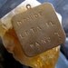 Donde Esta El Bano - Custom Engraved Brass Charm