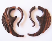 Large brown wooden wing fake gauges