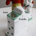 Two German Porcelain Figures of a Clown and a Bellhop, 1930s