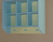 Two Level Six Cubby Wall Shelf in Blue and Yellow