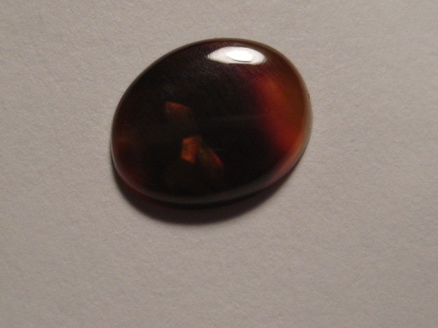 Mexican Fire Agate cab ....      12 x 10 x 2.7 mm  ......................    782