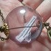 The REAPING OF District 12 The Hunger Games necklace Inspired - buyer gets to add their name to the ball