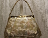 Reduced 1960s Vinyl Covered Fabric handbag was 22.00