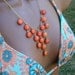Orange Stone Bib Necklace. Orange quartz cascade drapery necklace. Fashion.