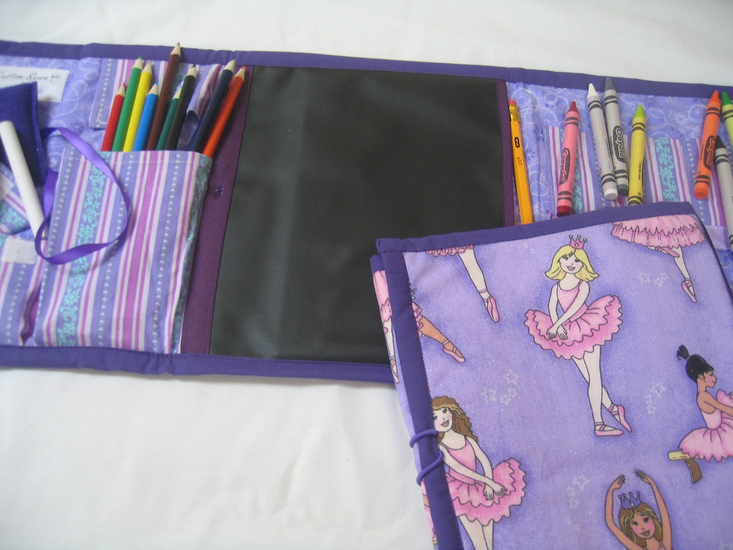 Ballarina Art Tote in a colorful pink and purple print complete with chalkboard, chalk, eraser, paper, pencil, crayons, and colored pencils