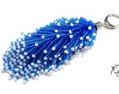 Whose tail is this. Handbag Charm Keychain.