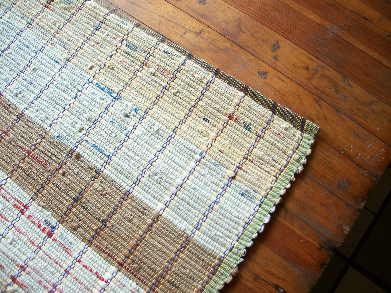Brown Upcycled Rug Woven from Plastic Grocery Bags.