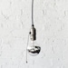 Black and White Pendant Light Cord w/ Large Silver Globe Bulb