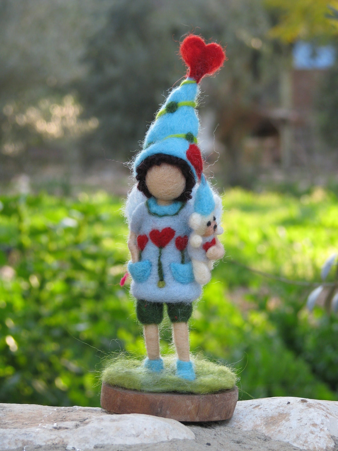 Needle felted waldorf inspired elf with teddy bear