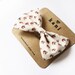 apple and ivory deluxe bow clip