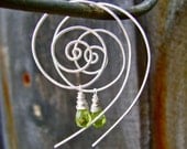 Recycled Sterling Silver Spiral Earrings with Peridot Dangles. Jewelry by FullSpiral on Etsy.