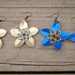 Everlasting Flower earrings in gold and blue
