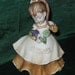 Lefton February Girl Vintage Figurine w/ Lovely Face Flowing Dress Apron and Purple Flowers
