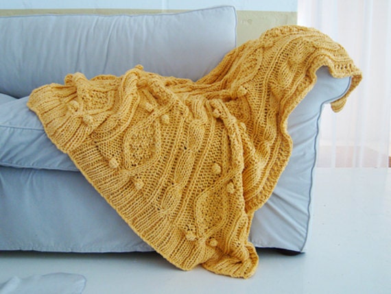 Yellow cable knit blanket