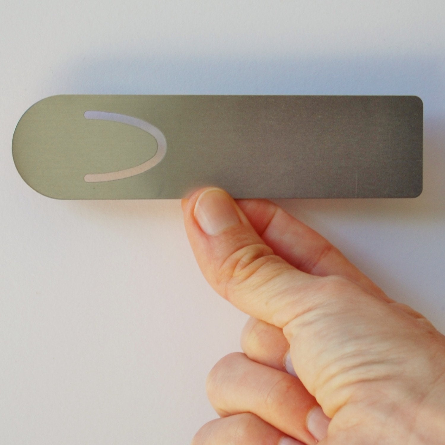 Careful aluminum bookmark