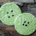 Huge oversized Ceramic Button with large leave pattern.