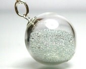 Clear color microbeads in clear hand blown glass beads pendant