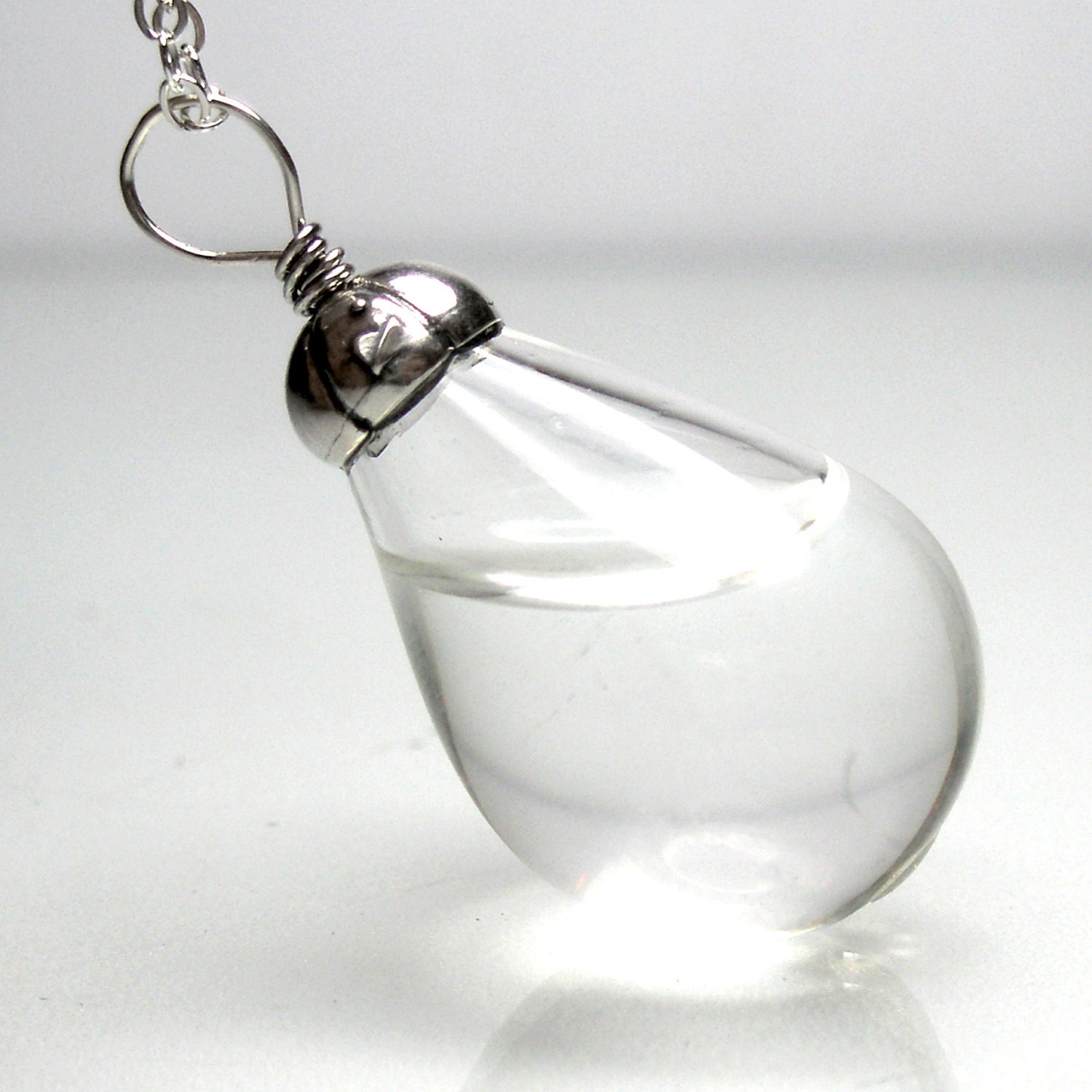 Clear color water in tear drop hand blown glass silver plated pendant