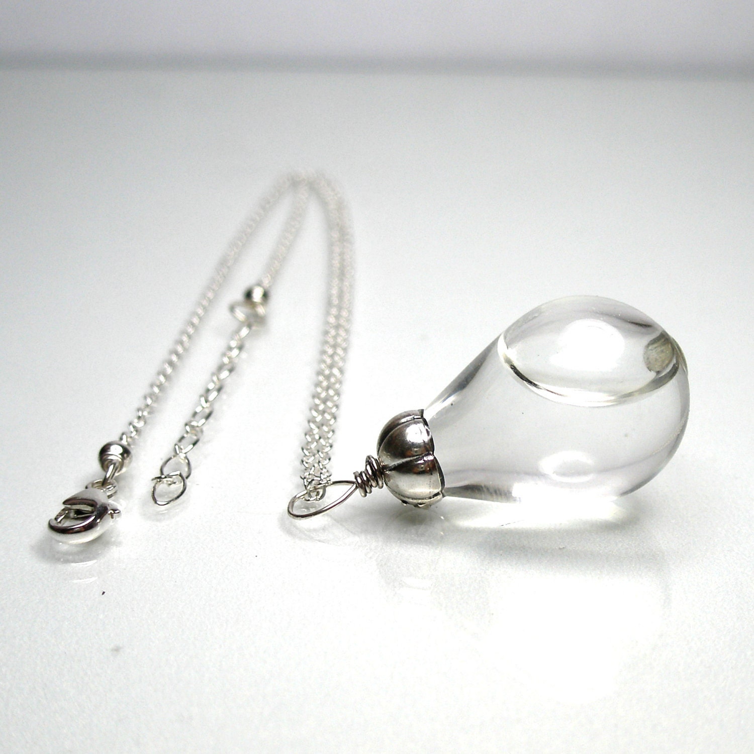 Clear color water in tear drop hand blown glass silver plated pendant