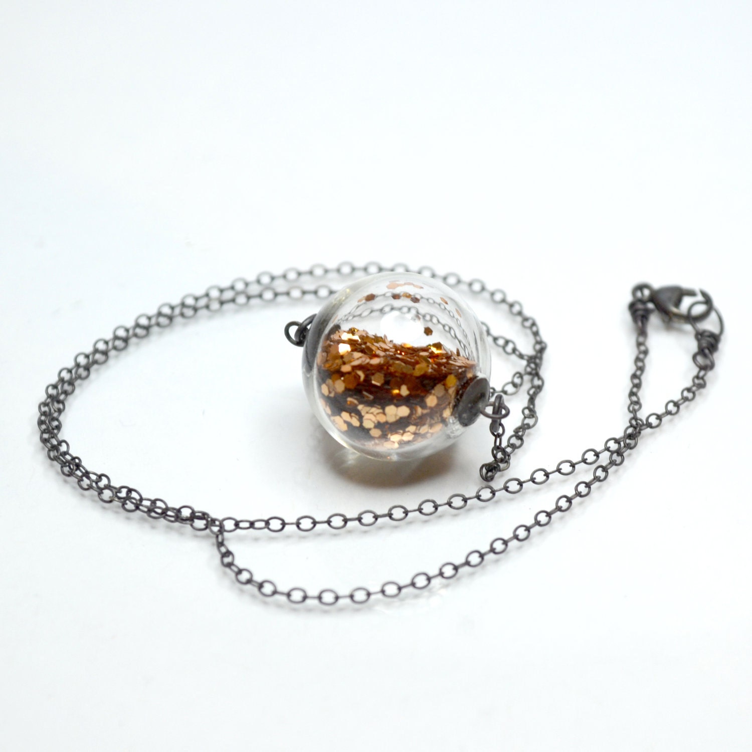 Copper glitter necklace in round hand blown glass necklace