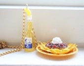 Nacho chips and beer with lemon necklace